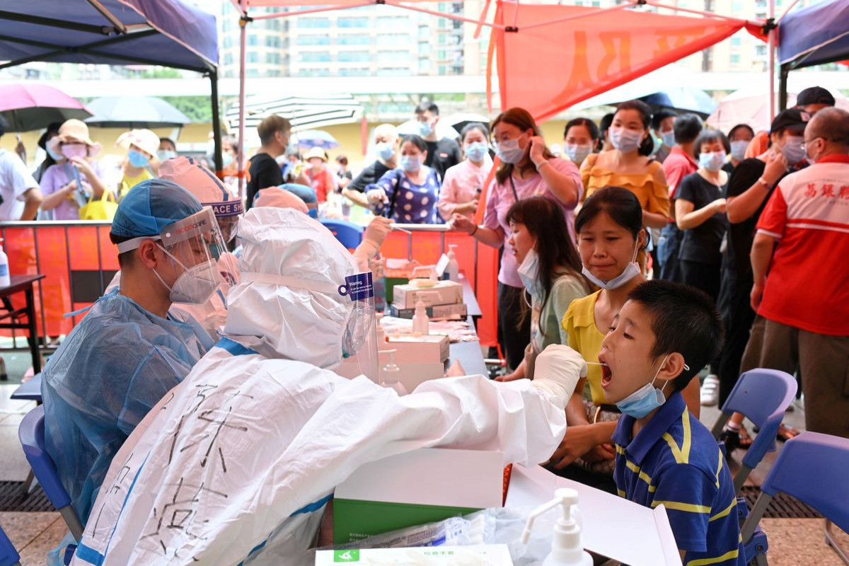 China sees highest daily coronavirus cases in current outbreak