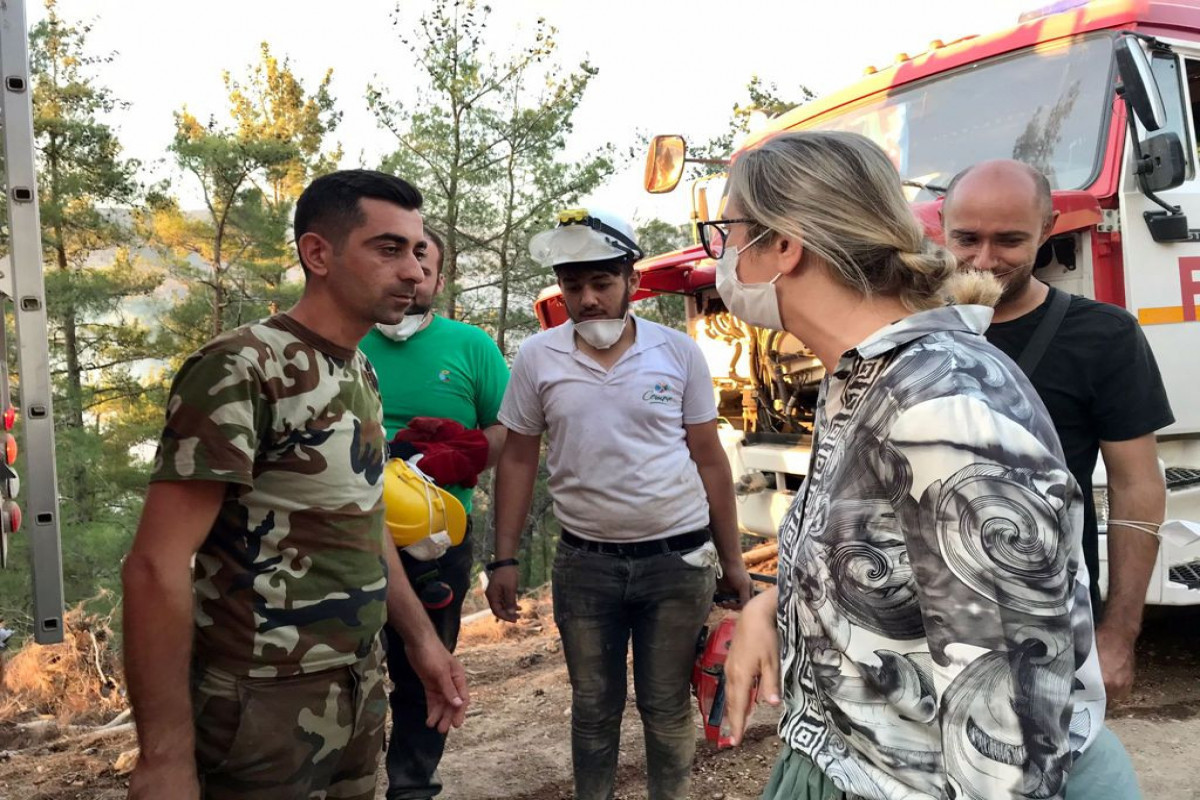 AK Party Izmir MP Ceyda Bolunmez Cankiri with Azerbaijani firefighter