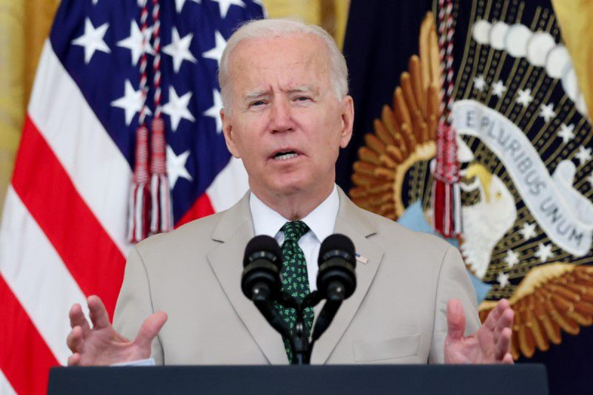 In call, Biden commends Japan's Suga for successful Olympics