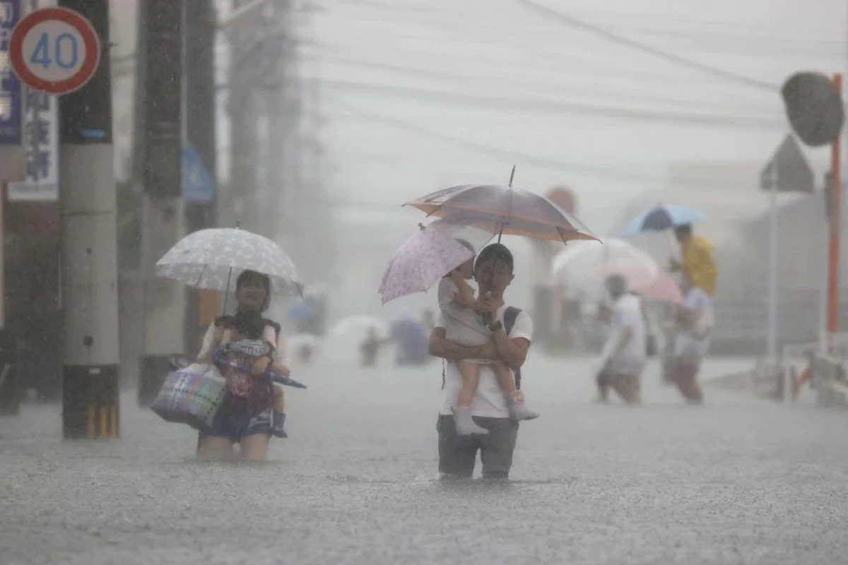 One dead, two missing as torrential rains slam Japan, risk alerts broadened