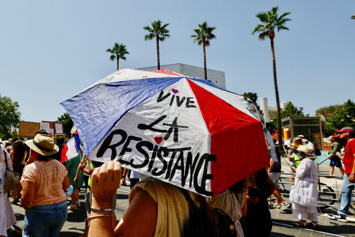 Protesters in France denounce COVID health pass rules for fifth weekend