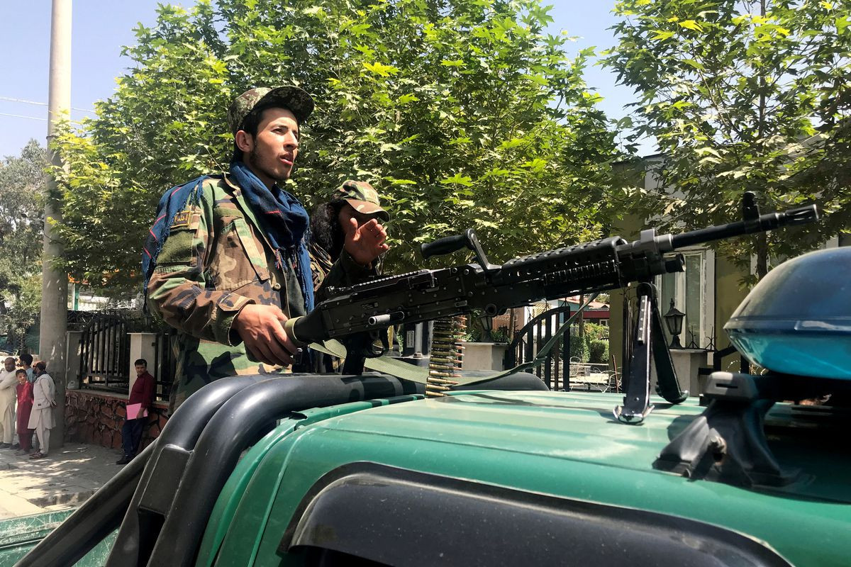 Taliban pledge peace and women's rights under Islam as they strike conciliatory tone