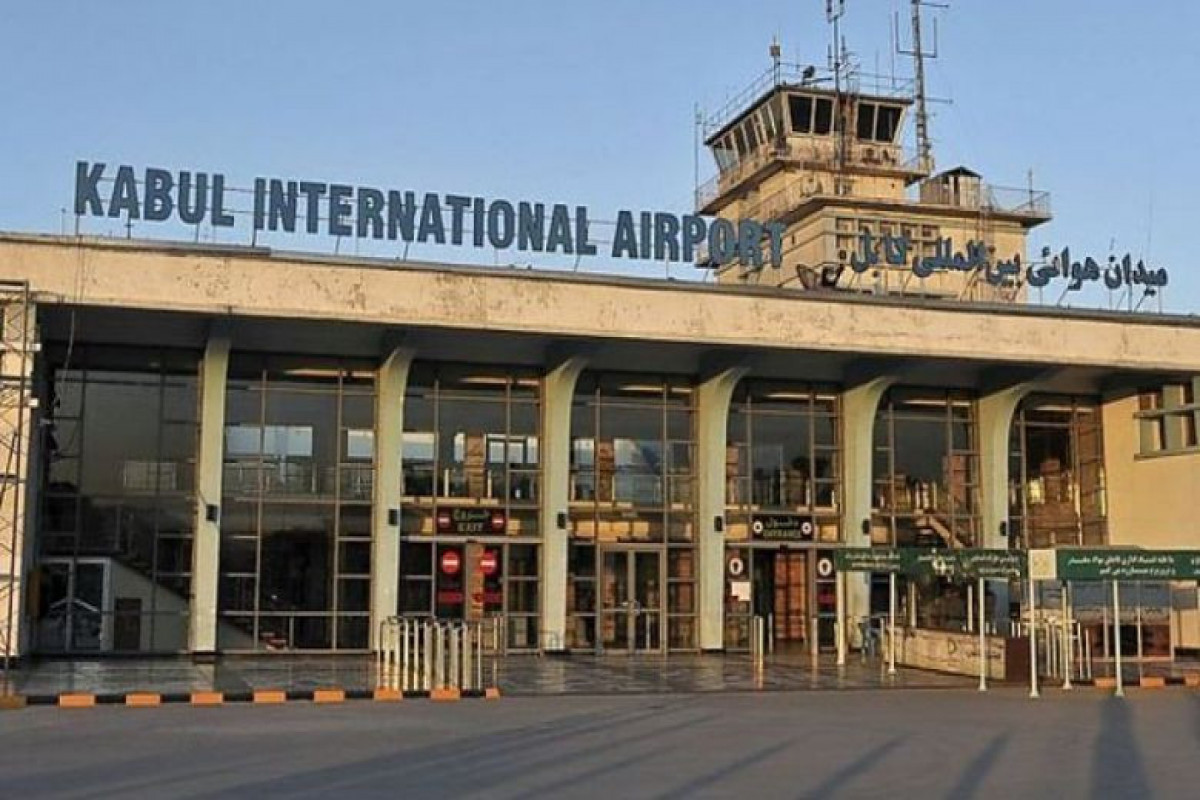 Twelve people dead in stampede and shootout at Kabul airport