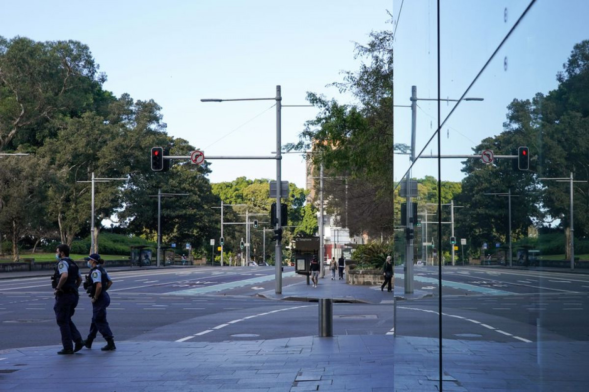 Sydney imposes nightly curfew as Australia battles Delta outbreak