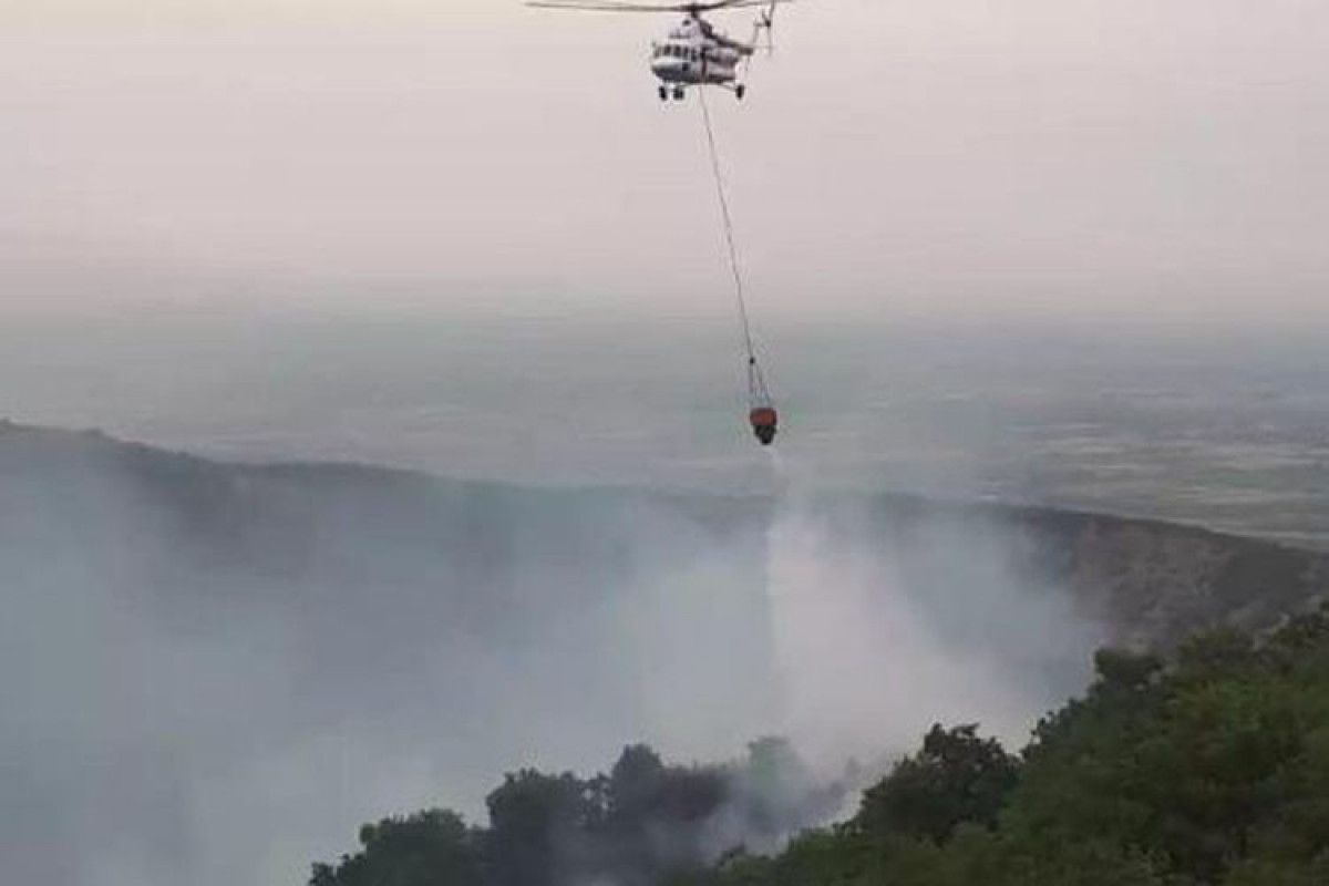 A helicopter involved in extinguishing fire in mountainous area of Azerbaijan's Oguz