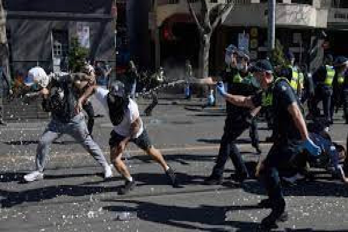 Police arrest hundreds of protesters as Australia reports record COVID-19 cases