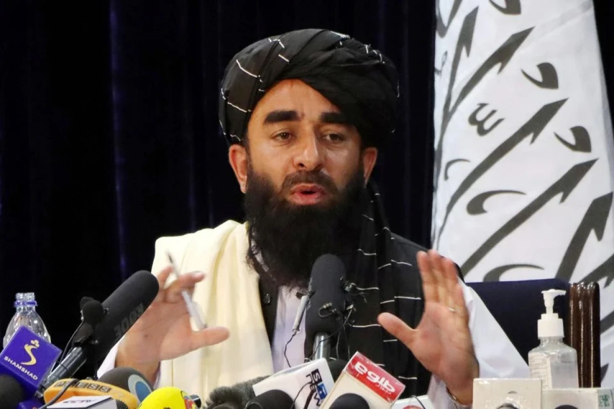 Taliban spokesman Zabihullah Mujahid speaks during a news conference in Kabul
