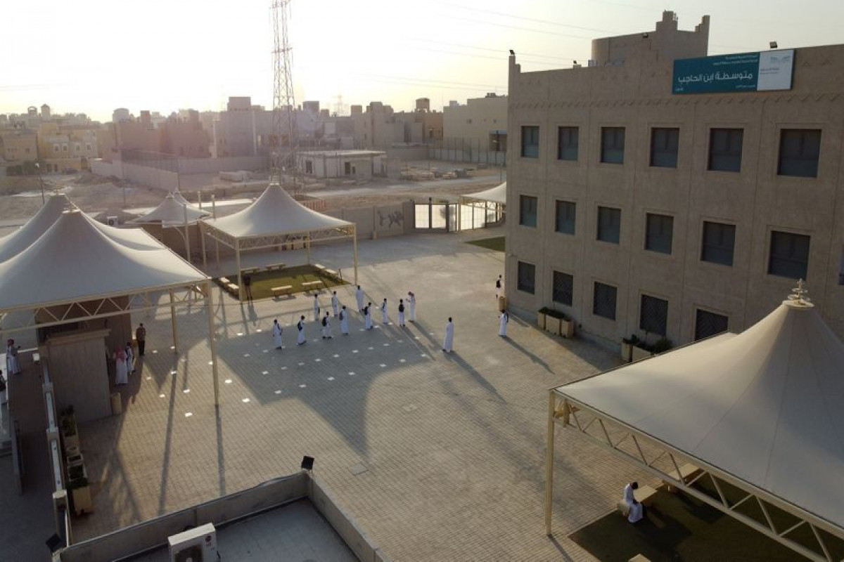 Saudi students return to school with masks and checks