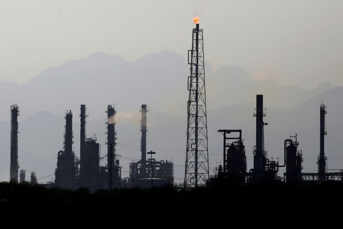 Oil prices slip on profit-taking, but head for strong weekly gain
