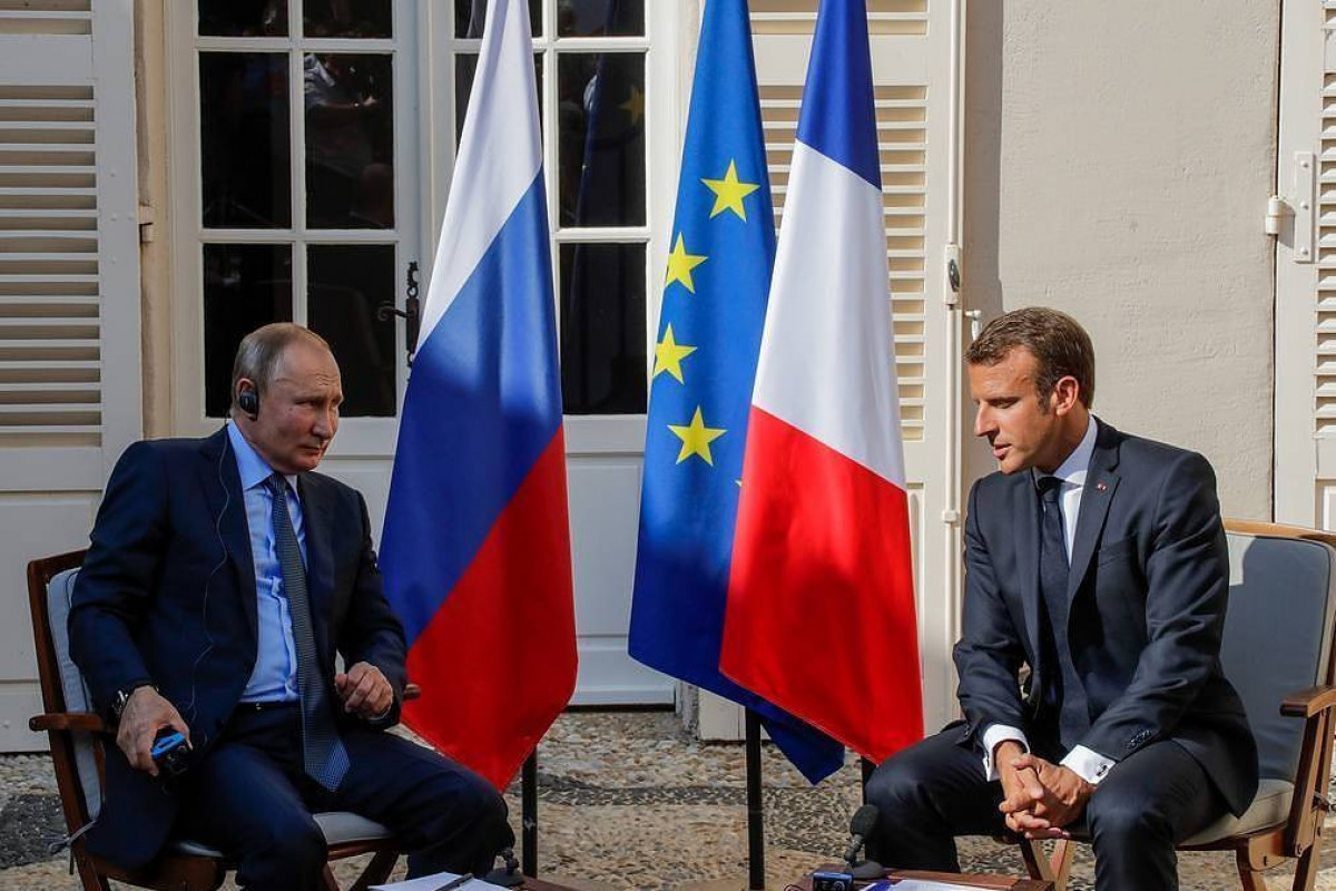 The presidents of Russia and France, Vladimir Putin and Emmanuel Macron