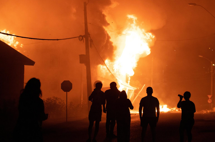 Protests erupt in Chilean lakeside resort after street performer shot by police
