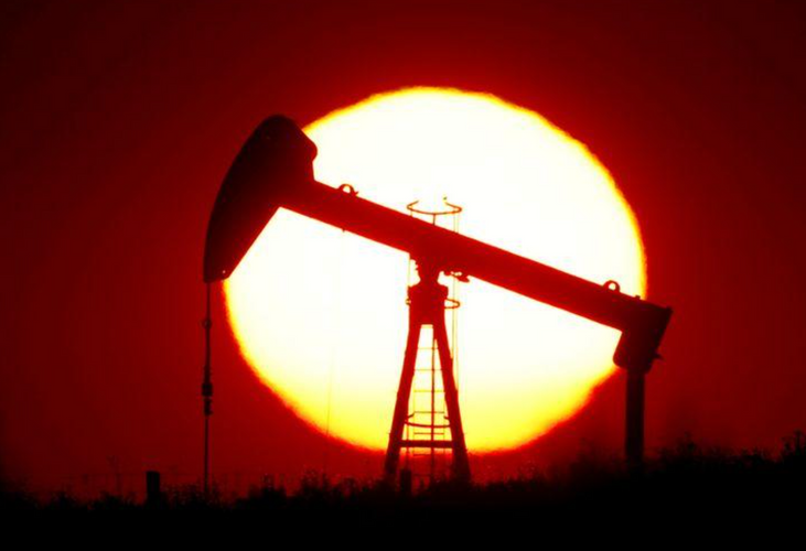 Oil prices jump more than $1 on slow U.S. output restart