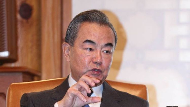 Chinese FM: Countries need to stand together and beat COVID 