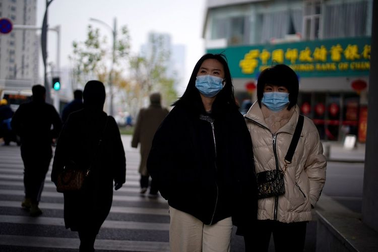 China steps up COVID restrictions near Beijing as local infections rise