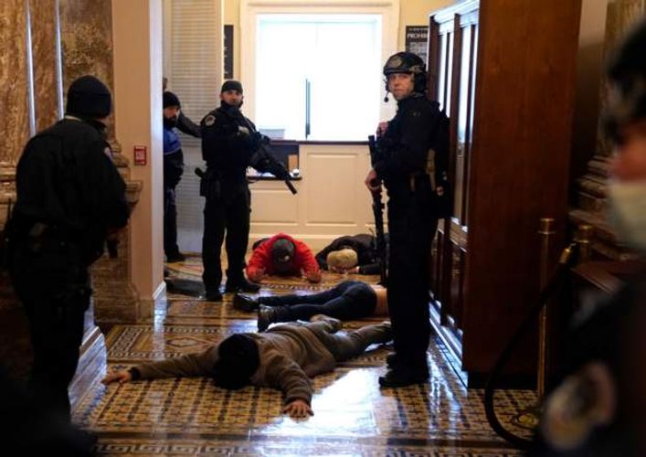 US Violence:  Guns drawn in the Senate chamber - PHOTO
