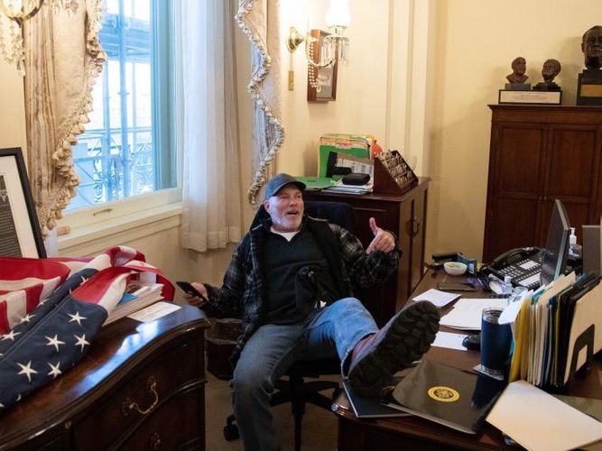 Man who sat at Pelosi's desk faces charges; FBI probes officer's death