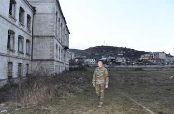 Azerbaijani President inspects the destroyed building of the Shusha Realni School - victim of Armenian vandalism