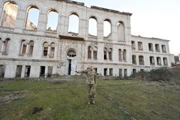 Azerbaijani President inspects the destroyed building of the Shusha Realni School - victim of Armenian vandalism