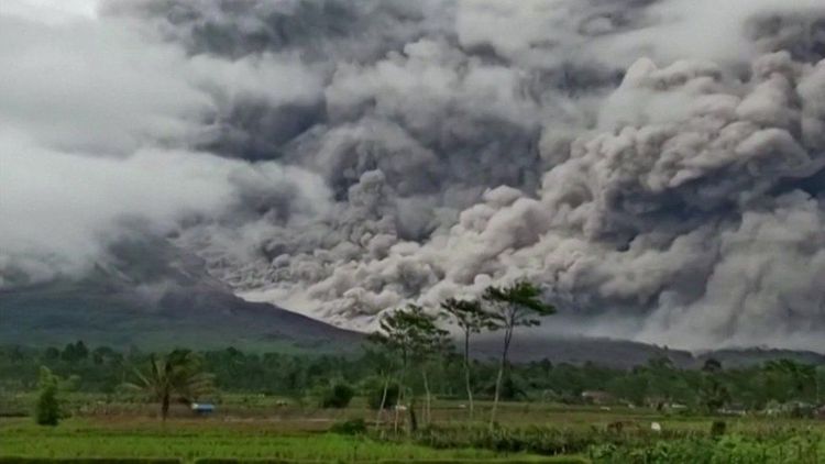 Erupting volcano spews ash above Indonesia's Java island