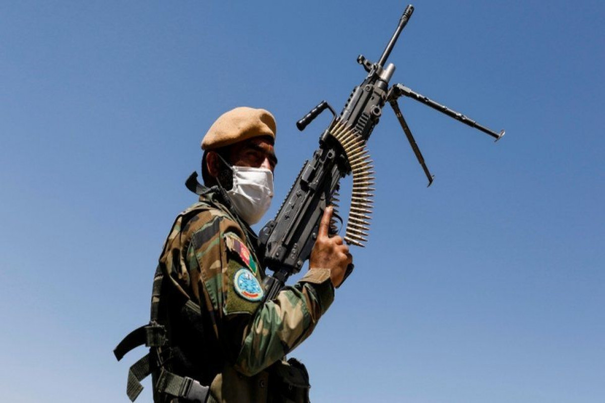 Afghan troops flee country after Taliban clashes