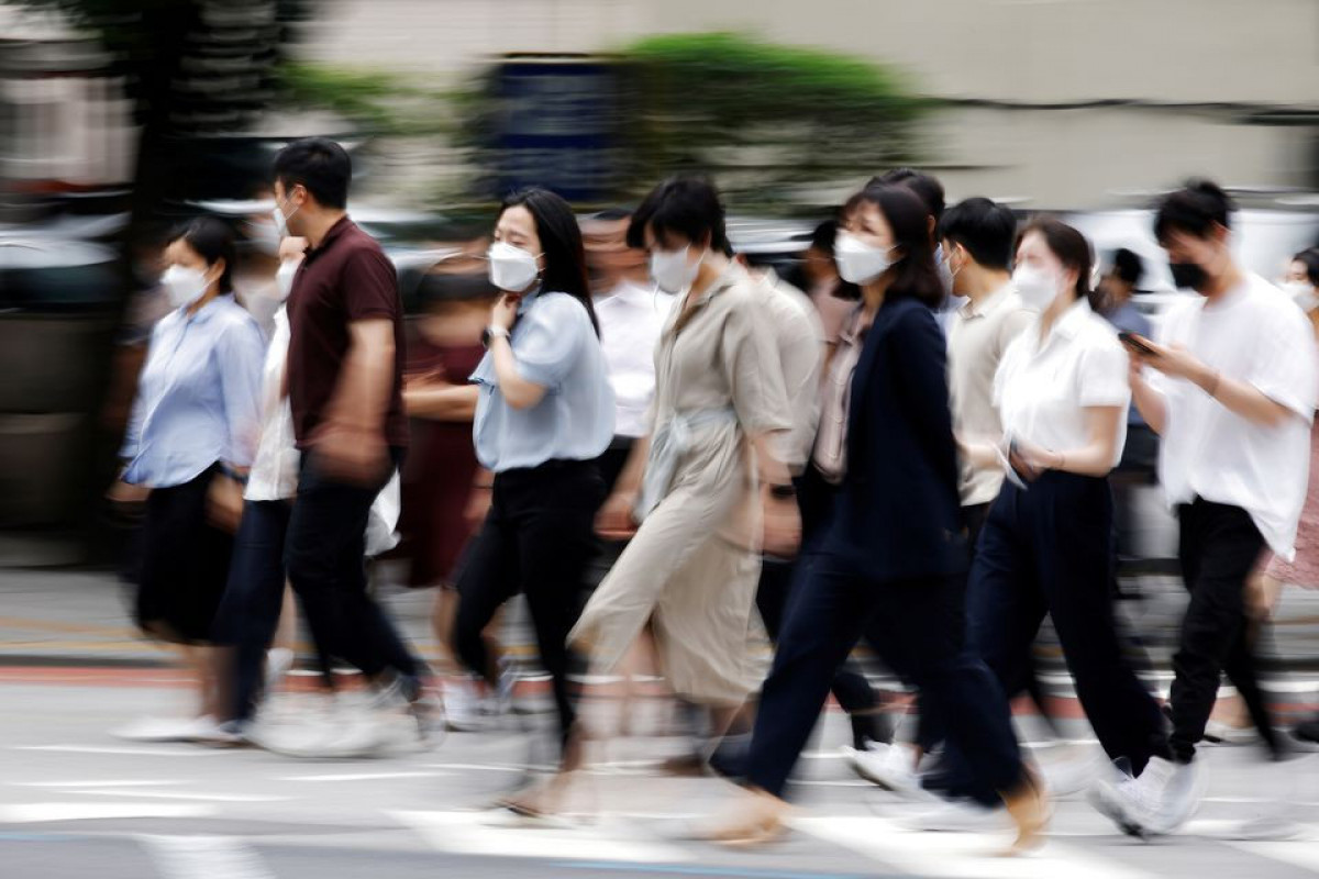 South Korea considers reimposing restrictions as COVID-19 cases surge