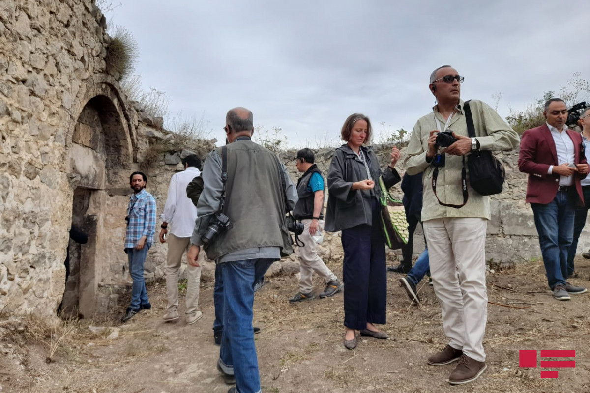 Diplomats watch wreckage of Panahali Khan's Palace in Shusha