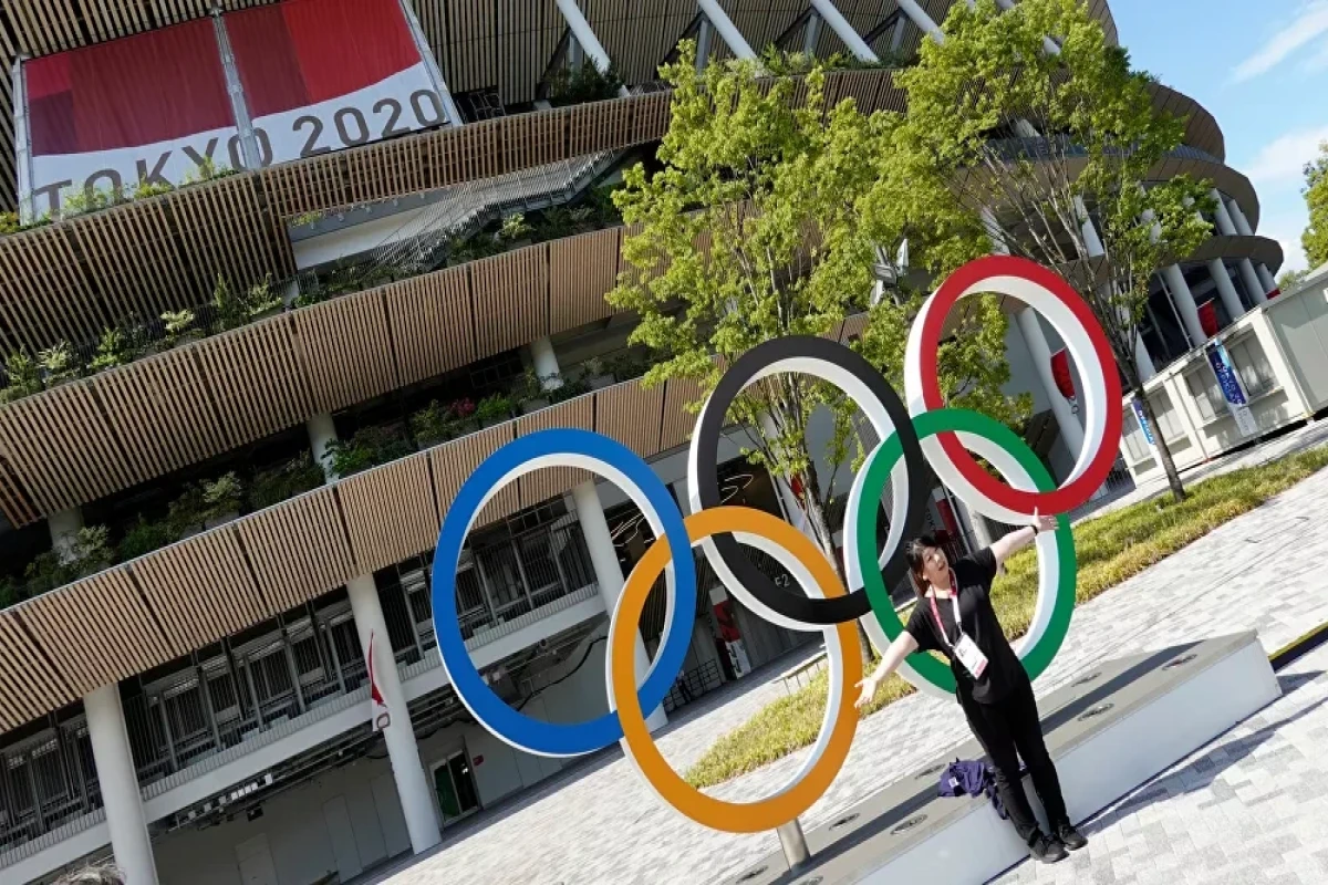 Japan police arrests man for scattering anti-Olympic flyers