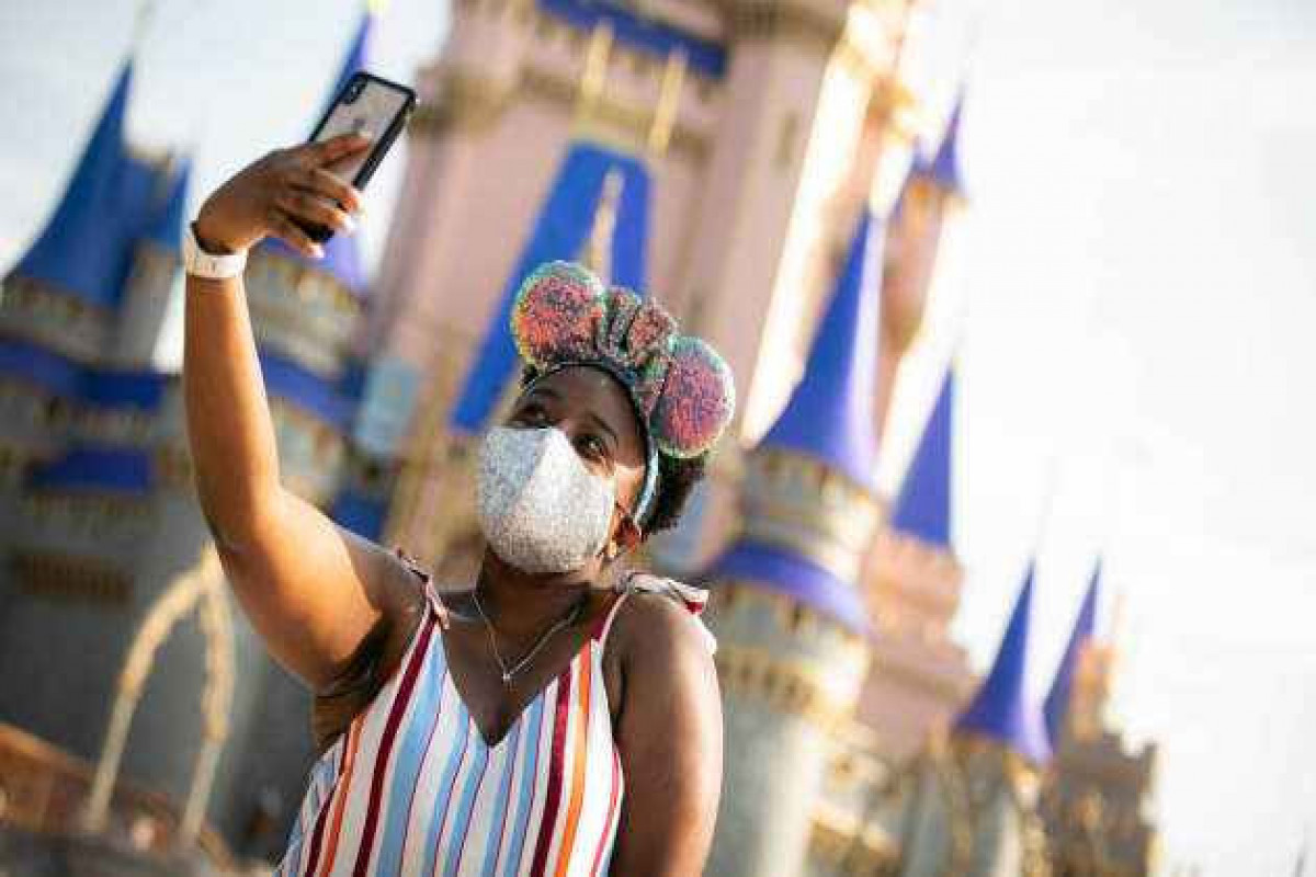 Disney’s domestic theme parks will require all parkgoers to wear masks indoors starting Friday