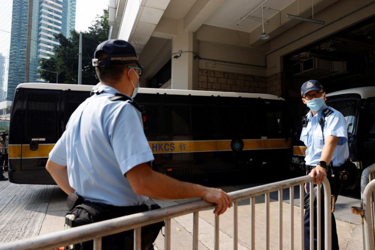 A prison van carrying Tong Ying-kit, the first person charged under the new national security law, arrives at High Court for a hearing, in Hong Kong, China, July 27, 2021.