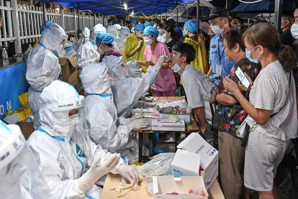 China’s Guangdong tightens coronavirus measures as cases persist