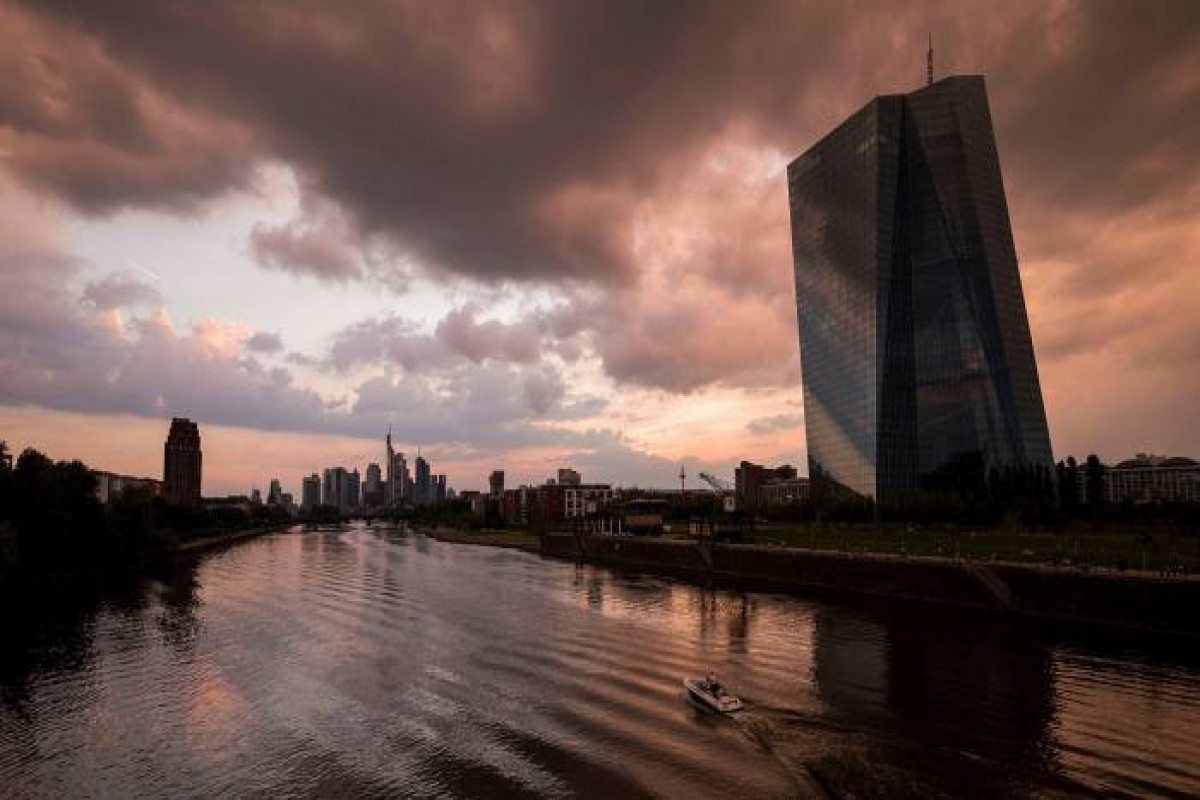 ECB raises inflation forecast but sticks to bond-buying plan