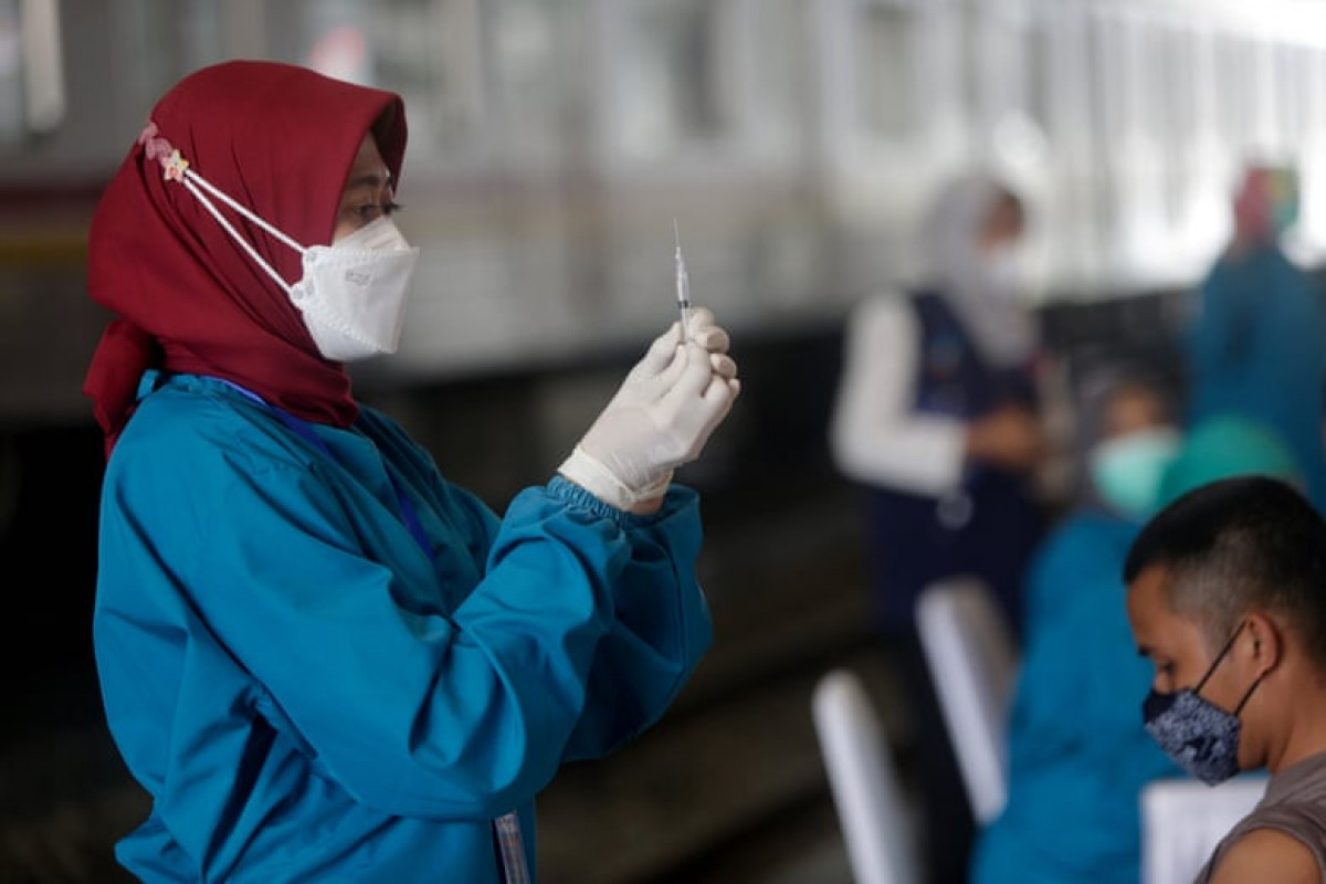 Healthcare workers in Indonesia contracting Covid despite vaccinations