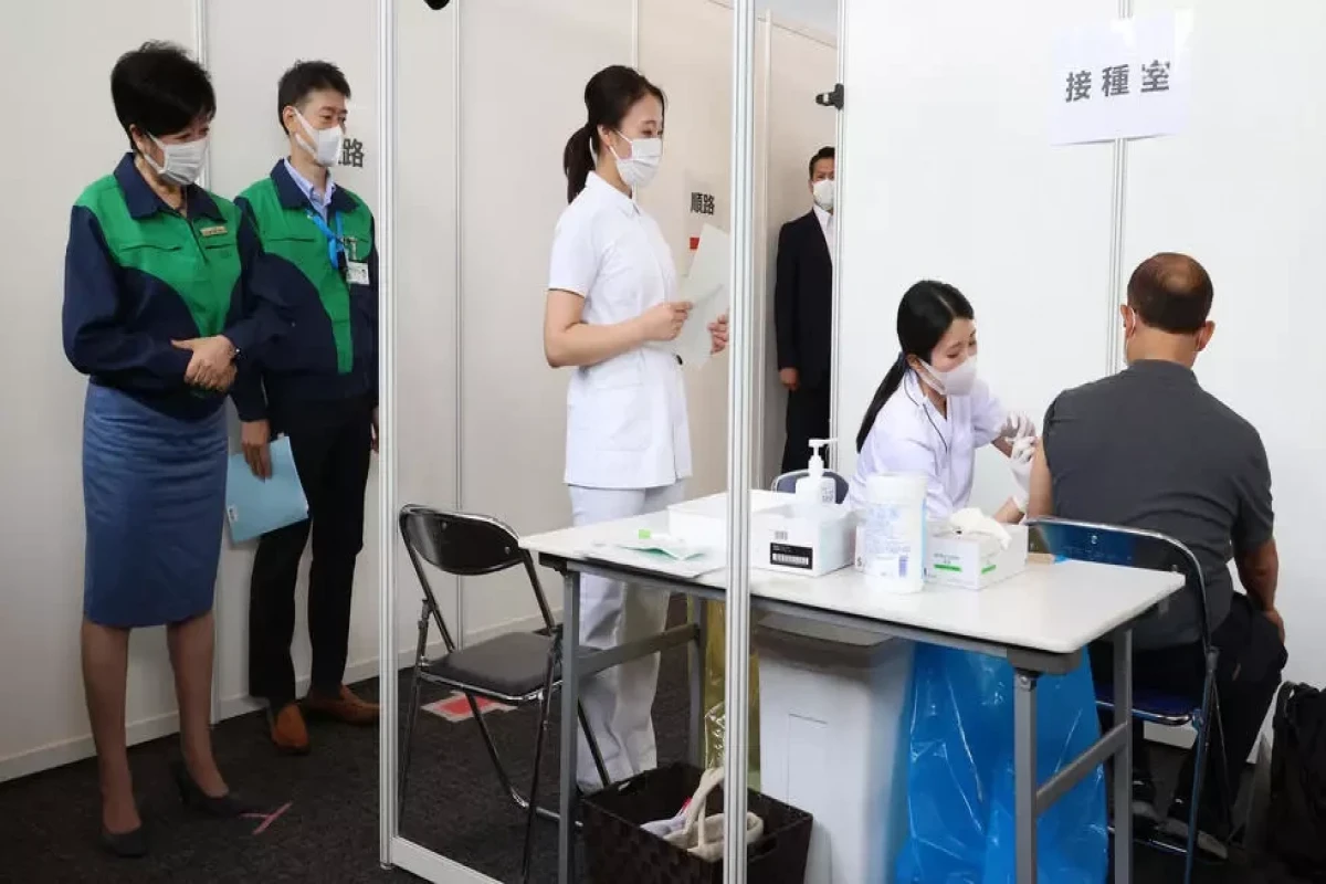 Olympic staff, volunteers vaccinated as Tokyo Games near