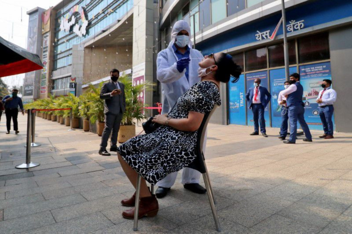 India reports 60,753 new coronavirus cases
