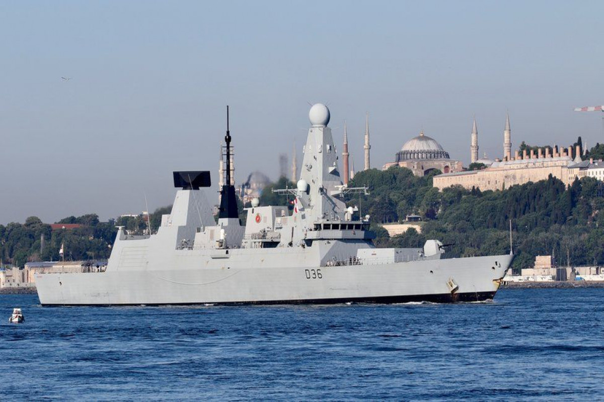 UK denies Russia fired warning shots near British warship