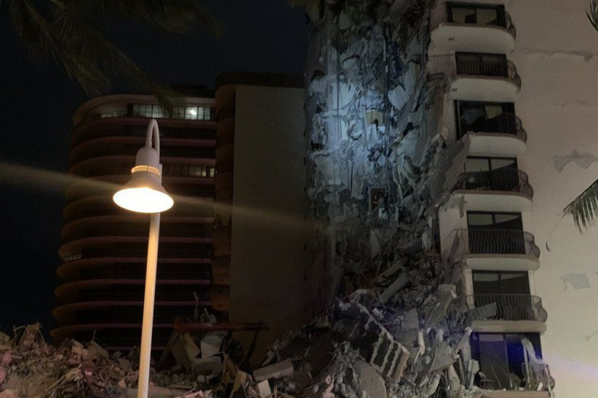 Miami building collapse: rescuers search rubble for survivors