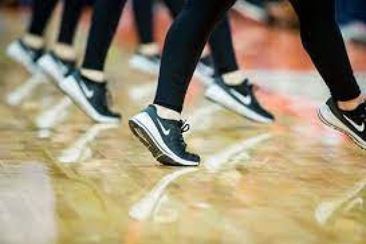 Nike shares surge more than 14%, hit record high as $50 billion sales outlook tops expectations