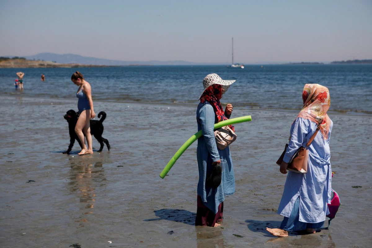 Record heat forces western Canada province to shut schools, universities