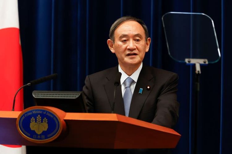 Japan PM Suga says to probably invite Biden to Olympics