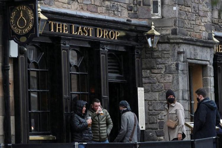 Britain has no immediate plans for COVID passports for pubs