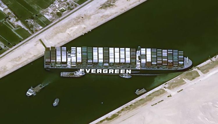 Over 320 vessels awaiting transit through Suez Canal blocked by huge container ship