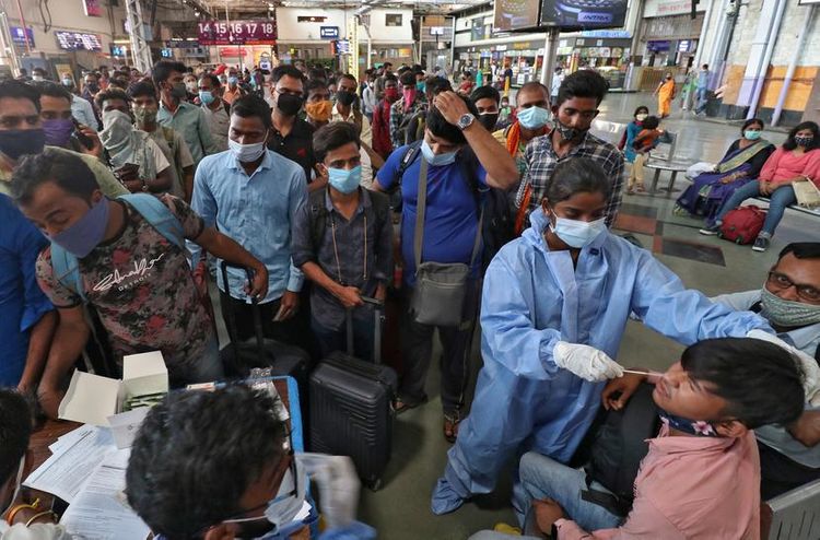 India's coronavirus cases peak over 12 million for first time