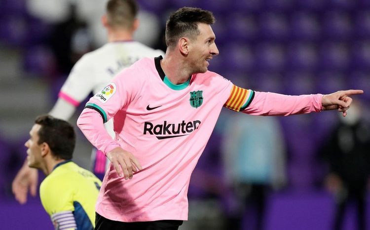 Barcelona star's football boots auctioned for $173,000