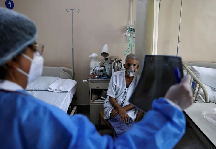India's COVID-19 case total nears 20 million