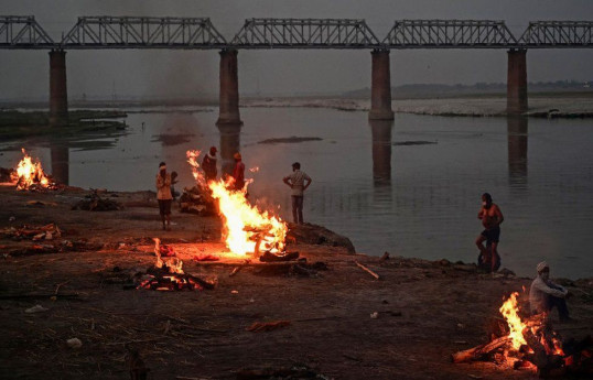 Dozens more bodies wash up on Ganges river bank in India