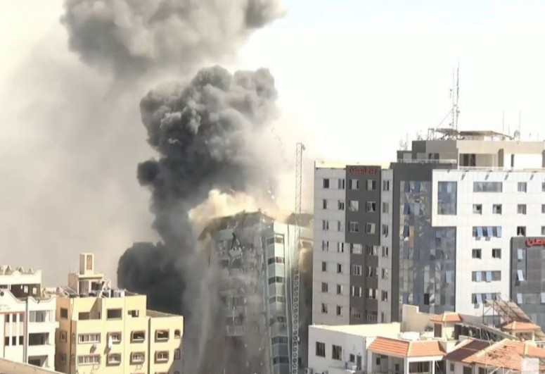 Building in Gaza with international media houses hit by airstrike