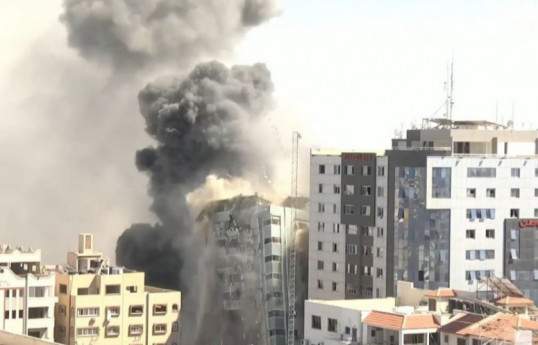 Building in Gaza with international media houses hit by airstrike