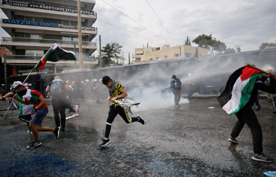 Police fire water cannon at pro-Palestinian demonstrators in Athens