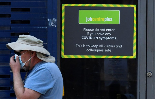 UK jobless rate falls again, hiring up as lockdown eases