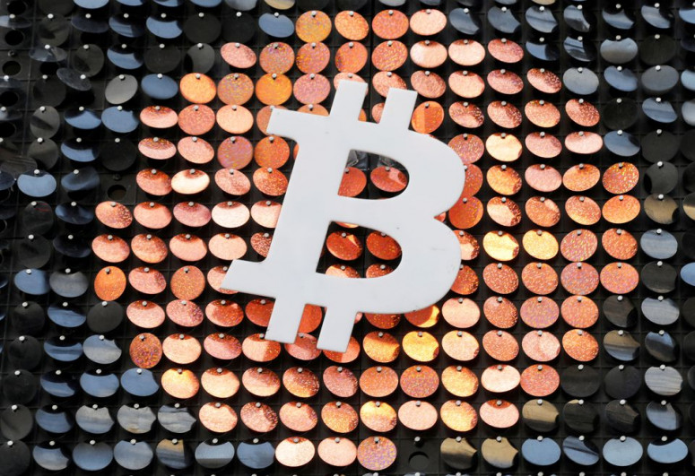 Bitcoin slides below $40,000, ether tumbles